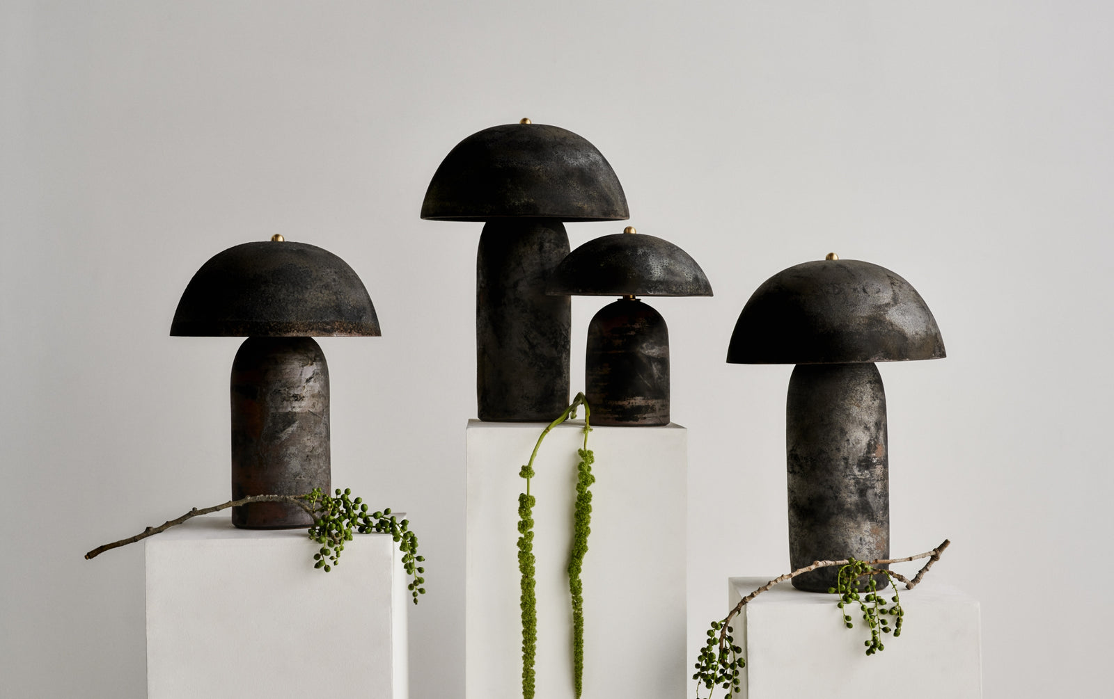 Ceramicah - Raku Tera Lamps in Black Velvet finish placed on pedestals 