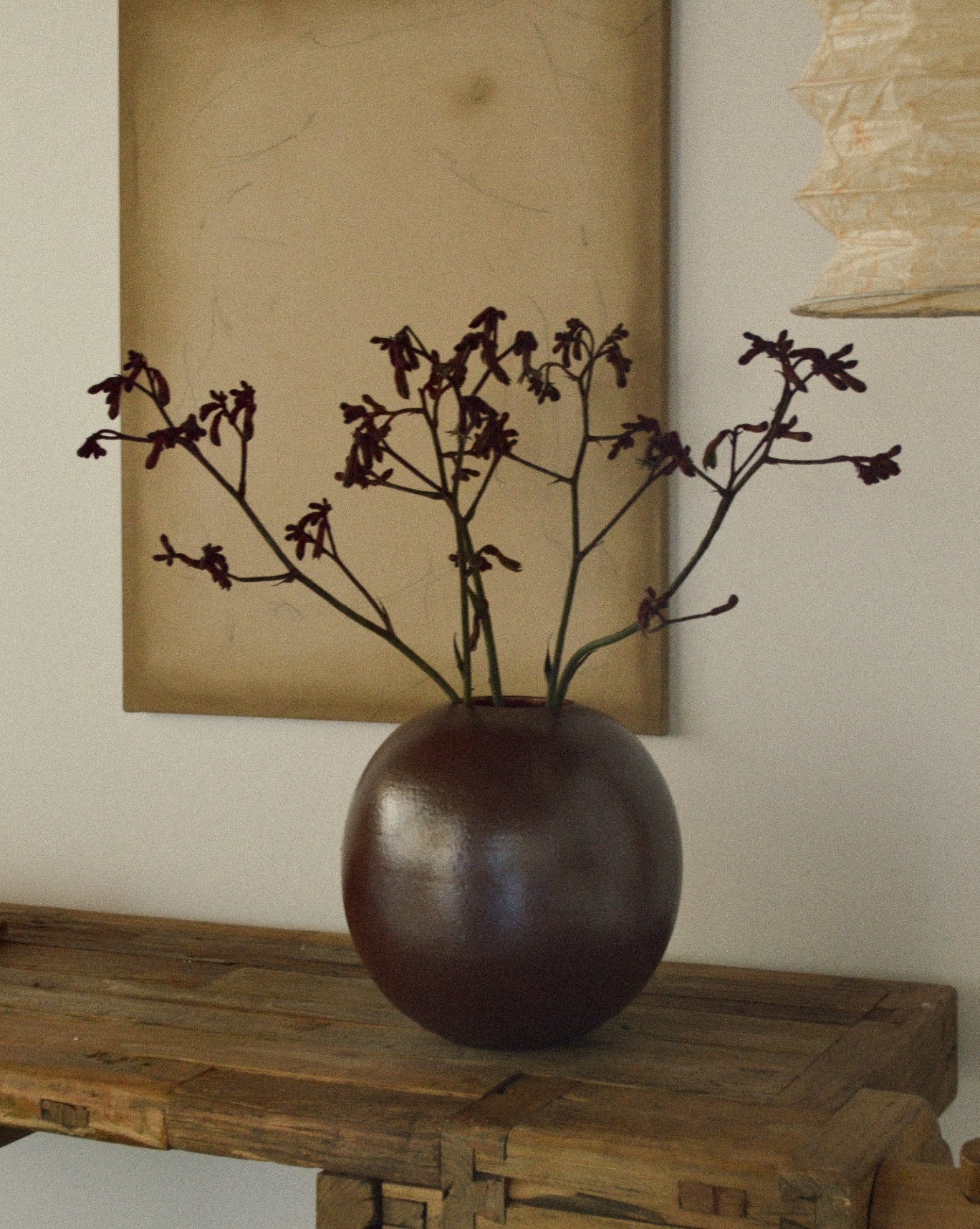 Ceramicah - Shino vessel filled with flowers and placed on a table